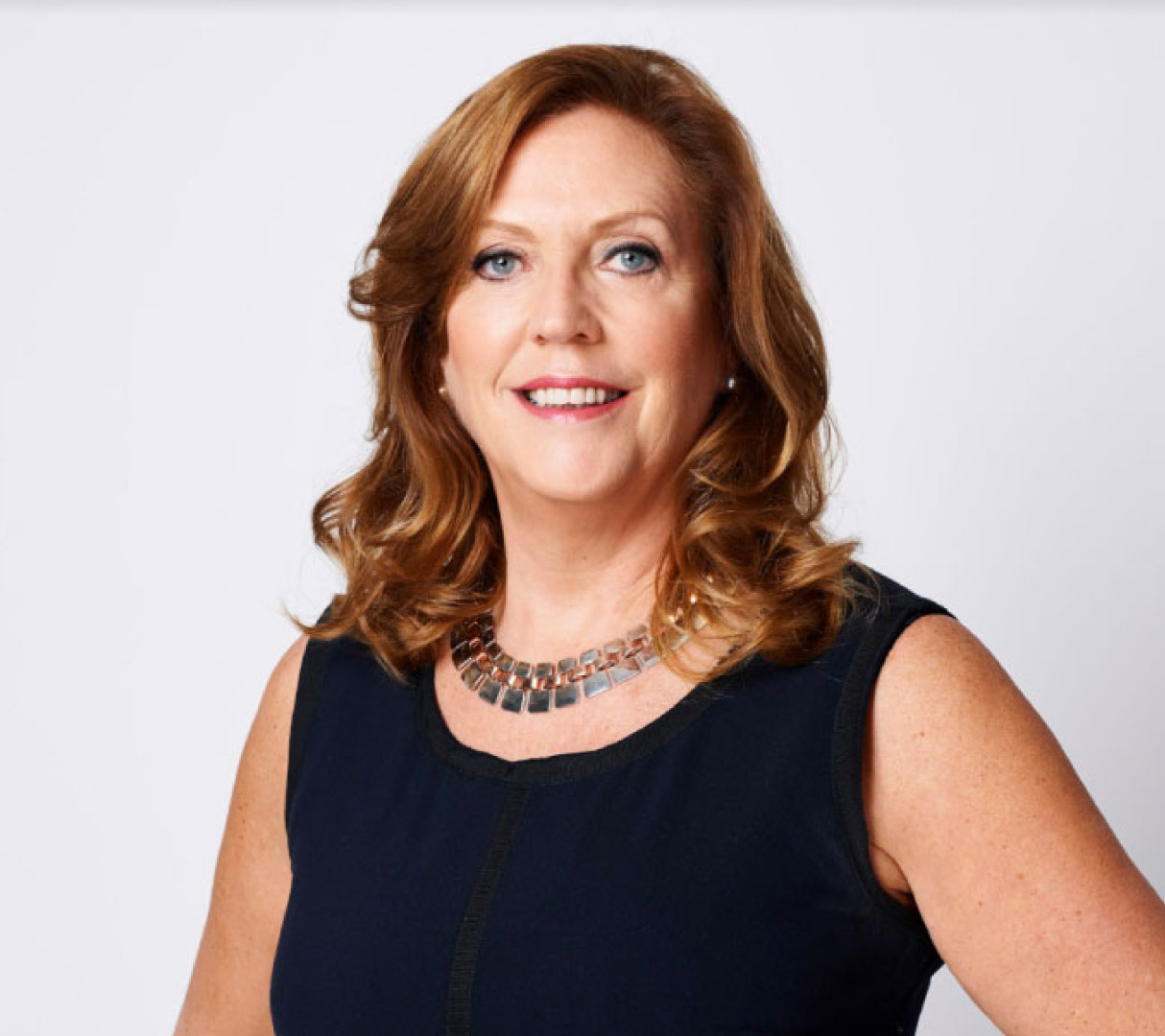 Jenny Campbell wearing dark dress with necklace